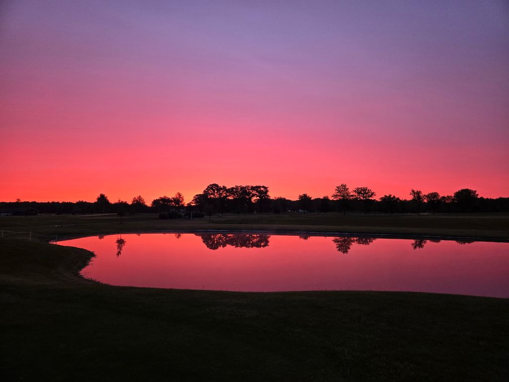 Pike Run Golf Club golf green at sunset